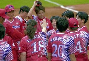 Japan kicks off Olympic softball with win